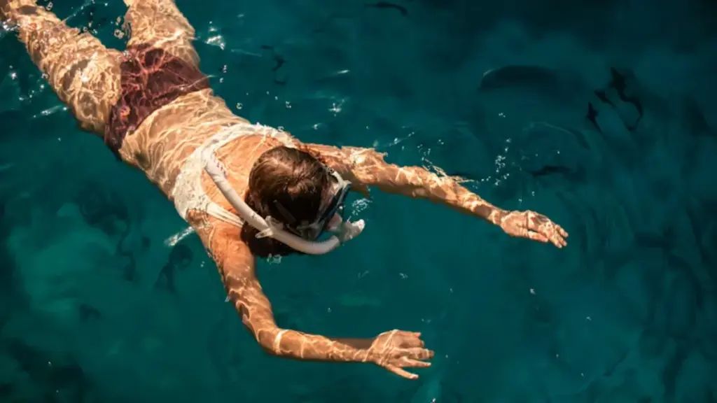 a woman is diving
