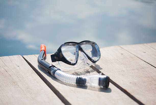 snorkel-equipment-in-front-of-water